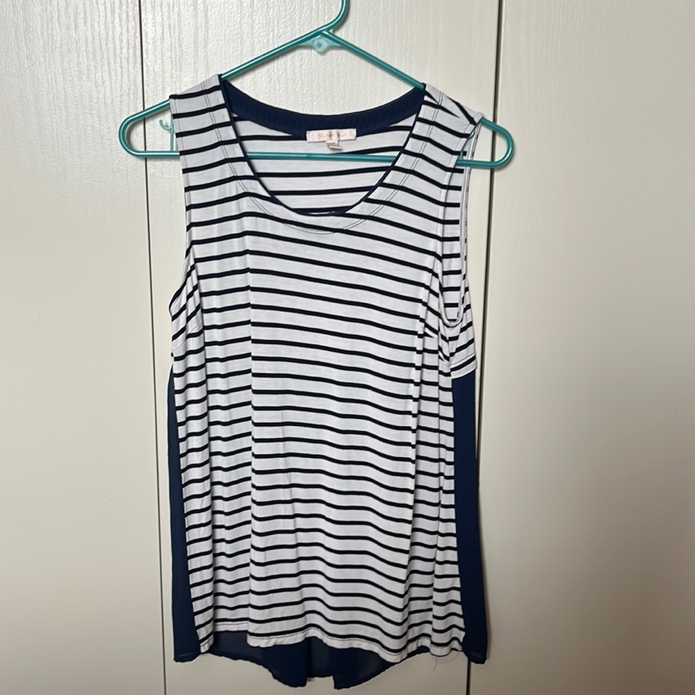 Skies are blue. Size small. Blue stripes with sheer back!